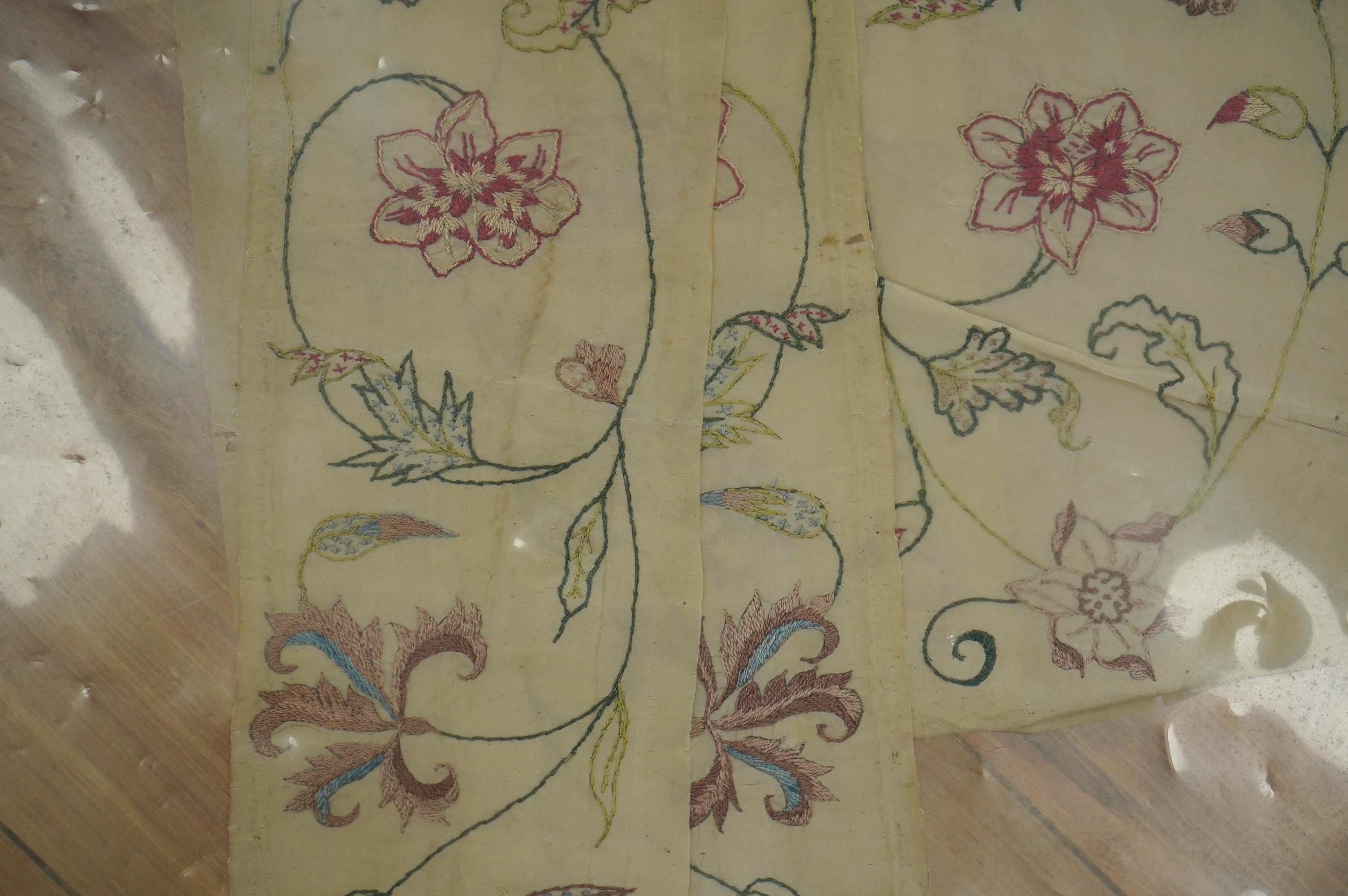 Two pairs of 18th century embroidered silk dress panels, one pair sleeve panels, the other pair possibly bodice panels, all panels hand embroidered in multi-coloured silk threads into a floral vineous design, sleeve pane